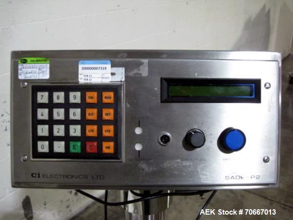 Used CI Electronics Checkweigher, Model SADE P2, with feed dish, 115V, serial #TP736.  NOTE: PRICE INCLUDES A 15% BUYERS PREMIUM.