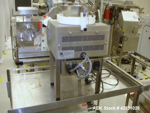 Used Kirby Lester Tablet/Capsule Counter, Model KL100, Serial #C1031. AS IS WHERE IS, LOADING & REMOVAL FEES EXTRA, COST TO BE DETERMINED.
