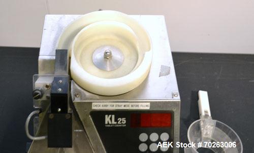Used Kirby Lester Tablet Counter, Model KL25, Stainless Steel. Count rate 820 per minute. Approximately 7-1/2’’ diameter vibrating bowl feeder, capacity (500) size 3 capsules. Maximum tablet size (0....