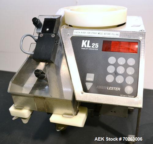 Used Kirby Lester Tablet Counter, Model KL25, Stainless Steel. Count rate 820 per minute. Approximately 7-1/2’’ diameter vibrating bowl feeder, capacity (500) size 3 capsules. Maximum tablet size (0....