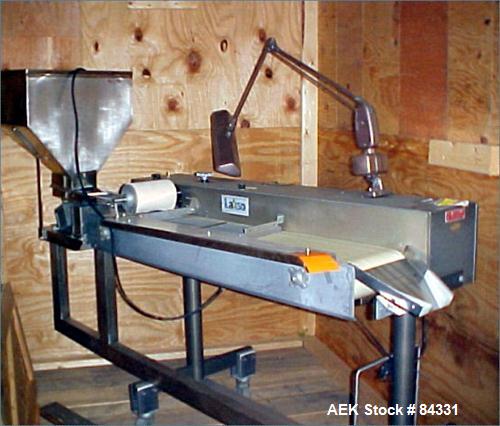 USED: Lakso Table Inspection Table, model 79. 10" wide x 48" long rubber belt, up to 20" per minute speed. Driven by a 1/3 hp, 90 volt DC gearmotor with controller. Includes an Eriez model 20A vibrat...