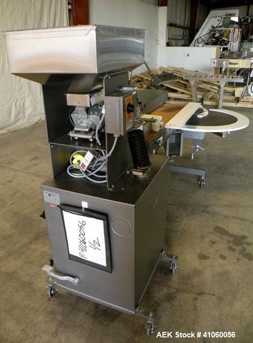 Used Lakso QA Inspection Table Consisting Of: (1) Lakso model 64 feeder, consisting of (1) feed hopper, approximate 1850 cubic inch capacity, (1) Eriez Magnetics model 0 variable speed vibrating sift...