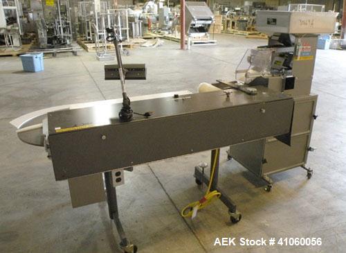 Used Lakso QA Inspection Table Consisting Of: (1) Lakso model 64 feeder, consisting of (1) feed hopper, approximate 1850 cubic inch capacity, (1) Eriez Magnetics model 0 variable speed vibrating sift...