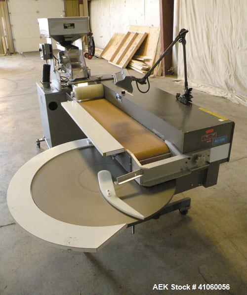 Used Lakso QA Inspection Table Consisting Of: (1) Lakso model 64 feeder, consisting of (1) feed hopper, approximate 1850 cubic inch capacity, (1) Eriez Magnetics model 0 variable speed vibrating sift...