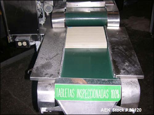 Used Lakso Tablet Inspection Belt. 12" wide with hopper and feeder. Mounted on a stand.