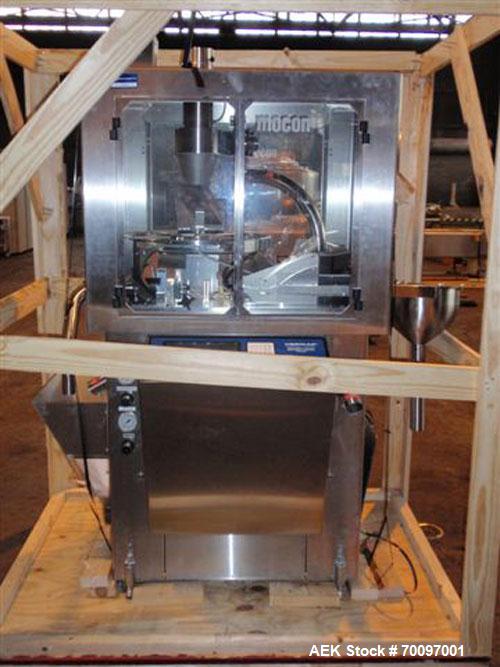 Used Mocon Vericap 4000 High Speed Capsule Checkweighing and Sorting System. Capable of speeds up to 132,000 capsules per hour. Can handle capsule sizes 00, 1, 2, 3 and 4 with proper changeparts. Bui...