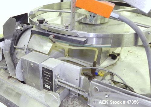 Used Mocon Vericap Capsule Inspection Machine, Model 2110. Machine is capable of inspecting size #0 capsules at 1800 per minute, size # 1, 2, 3, 4 at 2000 capsules per minute. Inclues control panel. ...