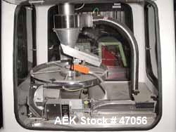Used Mocon Vericap Capsule Inspection Machine, Model 2110. Machine is capable of inspecting size #0 capsules at 1800 per minute, size # 1, 2, 3, 4 at 2000 capsules per minute. Inclues control panel. ...