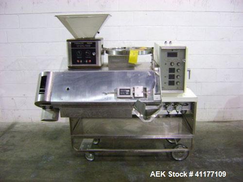 Used Mocon Capsule Weighing and Sorting Machine, Model Vericap 1800. Capable of up to 1800 capsules per minute. Has printer.