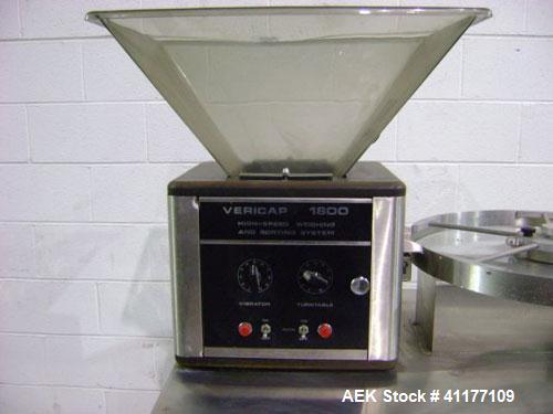 Used Mocon Capsule Weighing and Sorting Machine, Model Vericap 1800. Capable of up to 1800 capsules per minute. Has printer.