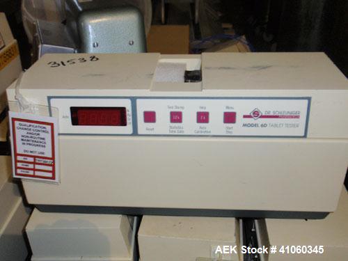 Used Dr. Schleuniger Pharmatron Tablet Hardness Tester, Model 6D. Approximate capacities: 25 tablets/3 minutes. Thickness 0-15mm (0-0.6’’), diameter 0-35mm (0-1.4’’), hardness and tolerance 400-500-8...