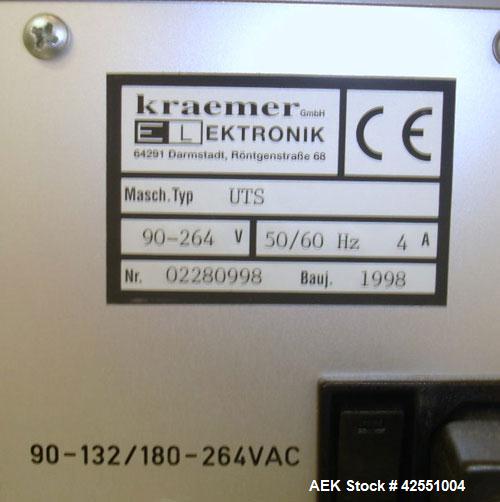 Used Kraemer Elektronik Universal Testing Machine, Model UTS. Fully automatic testing of the parameters weight, thickness, diameter and hardness. Rotary tablet table with Mettler Toledo scale. 90-264...
