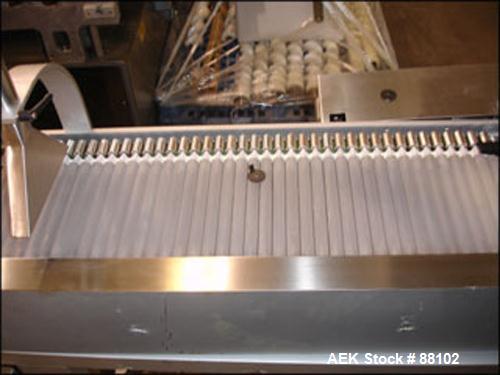 Used Seidenader Inspection Belt, Model V50-2-LR. 8" Long roller, feeder rated up to 100,000 capsules per hour or up to 50 kg tablets per hour. 6 kw, 110 volt, on base.