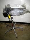 Used Key International Tablet Deduster, Model TD-101, 304 Stainless Steel. Air volume 1 to 2 cfm, vacuum 20 to 30 cfm. 115 volt. Mounted on stand with casters.