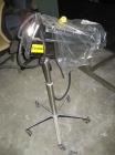 Used Key International Tablet Deduster, Model TD-101, 304 Stainless Steel. Air volume 1 to 2 cfm, vacuum 20 to 30 cfm. 115 volt. Mounted on stand with casters.