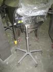 Used Key International Tablet Deduster, Model TD-101, 304 Stainless Steel. Air volume 1 to 2 cfm, vacuum 20 to 30 cfm. 115 volt. Mounted on stand with casters.