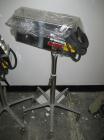Used Key International Tablet Deduster, Model TD-101, 304 Stainless Steel. Air volume 1 to 2 cfm, vacuum 20 to 30 cfm. 115 volt. Mounted on stand with casters.