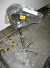 Used Key International Tablet Deduster, Model TD-101, 304 Stainless Steel. Air volume 1 to 2 cfm, vacuum 20 to 30 cfm. 115 volt. Mounted on stand with casters.