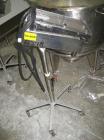 Used Key International Tablet Deduster, Model TD-101, 304 Stainless Steel. Air volume 1 to 2 cfm, vacuum 20 to 30 cfm. 115 volt. Mounted on stand with casters.