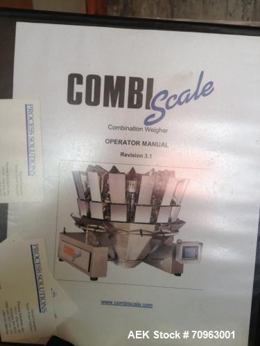 Used Combi Scale 10 Head Scale.  Stainless steel smooth bucket.  Rated up to 140 cycles per mnute.  Includes controls.