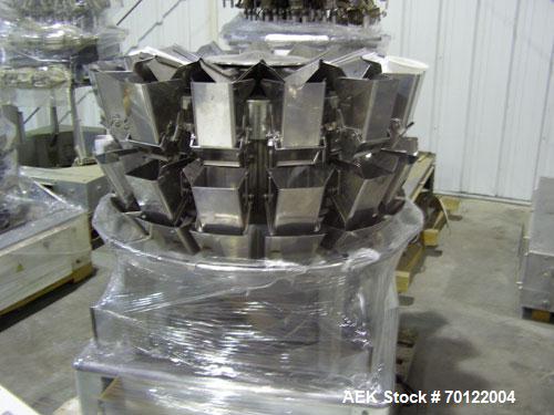 Used Ishida CCW-M-214W-S/30-PB High Speed Chute Unit, up to 120 bpm capable. Special "V" style radial feeder pans for increased accuracy at smaller target weights. Manufactured 2000.
