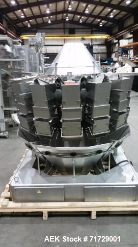 Used Ishida CCW-NZ-214W-S/70-WP. Fully wash down with dimpled buckets and chutes. Perfect for any products like, lettuce, beef jerky, vegetables, sausage patties, gummies, etc... Scale has a timing h...