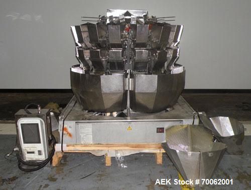 Used Ishida 16 Head Multi-Purpose Weigher, Model CCW-Z-216B-D/30-WP, Stainless Steel Contact Parts. Designed for different weights of up to four products simultaneously, for discharge into the same p...