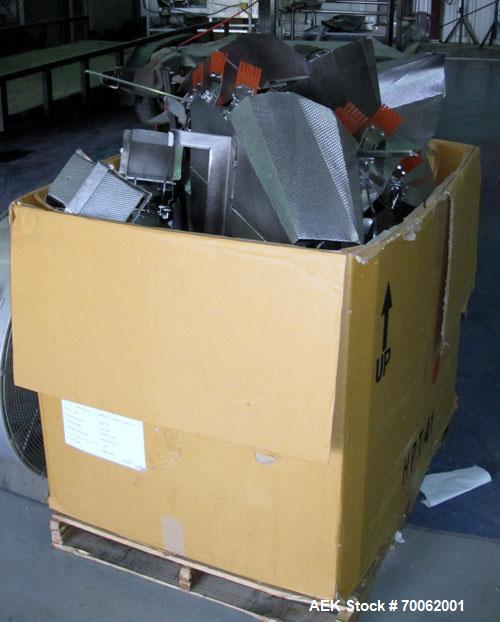 Used Ishida 16 Head Multi-Purpose Weigher, Model CCW-Z-216B-D/30-WP, Stainless Steel Contact Parts. Designed for different weights of up to four products simultaneously, for discharge into the same p...