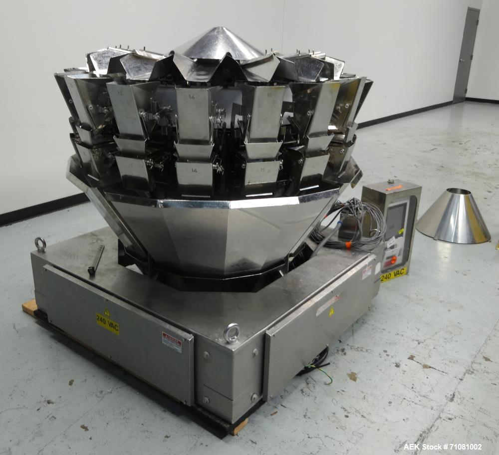 Used Ishida 16 Head Computer Weigher, Model CCW-Z-216W-S/20-WP, Serial 19102, Year 1992.  208 Volt, 60 hz, 10.9 amps, stainless steel contact parts.  Smooth buckets.