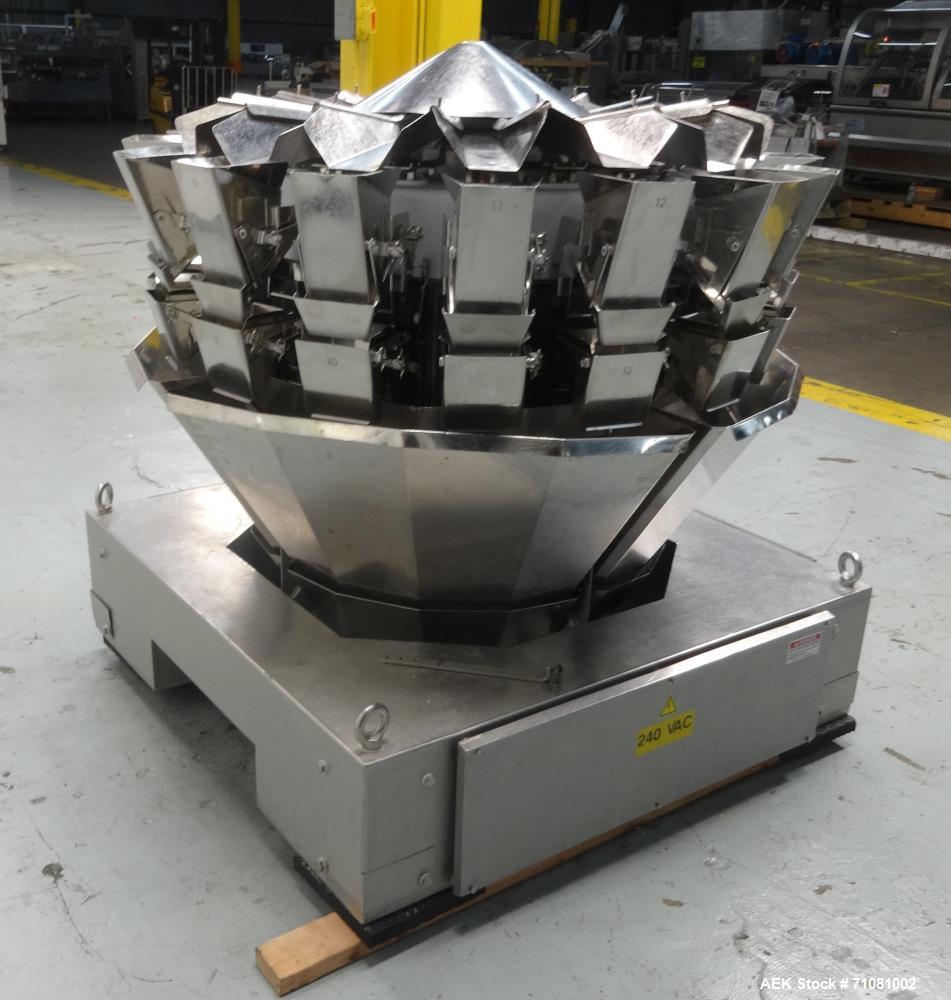 Used Ishida 16 Head Computer Weigher, Model CCW-Z-216W-S/20-WP, Serial 19102, Year 1992.  208 Volt, 60 hz, 10.9 amps, stainless steel contact parts.  Smooth buckets.