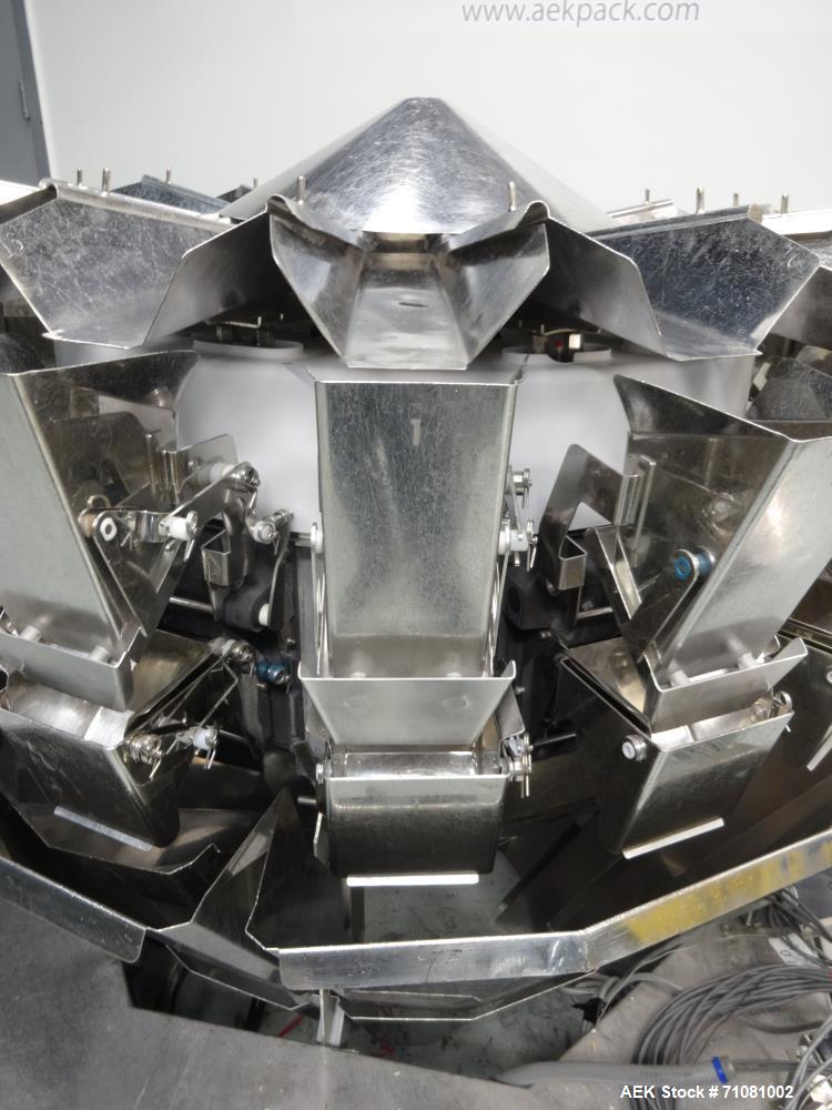 Used Ishida 16 Head Computer Weigher, Model CCW-Z-216W-S/20-WP, Serial 19102, Year 1992.  208 Volt, 60 hz, 10.9 amps, stainless steel contact parts.  Smooth buckets.