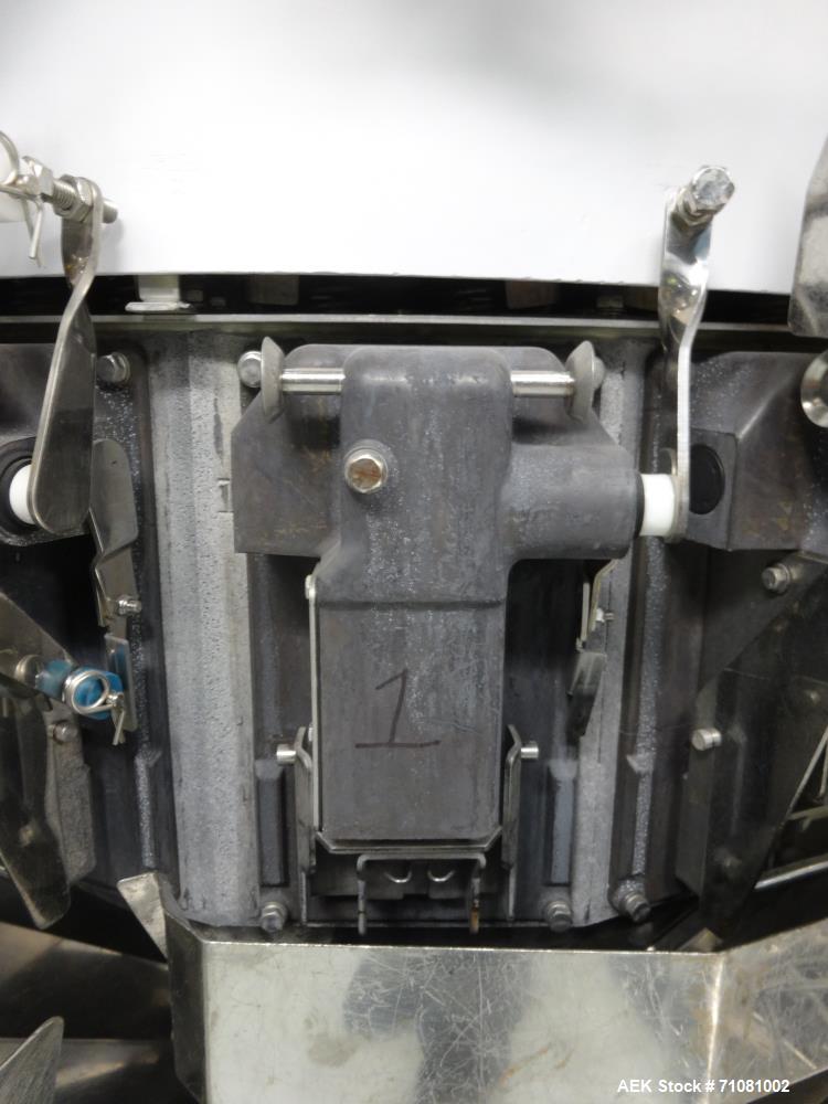Used Ishida 16 Head Computer Weigher, Model CCW-Z-216W-S/20-WP, Serial 19102, Year 1992.  208 Volt, 60 hz, 10.9 amps, stainless steel contact parts.  Smooth buckets.