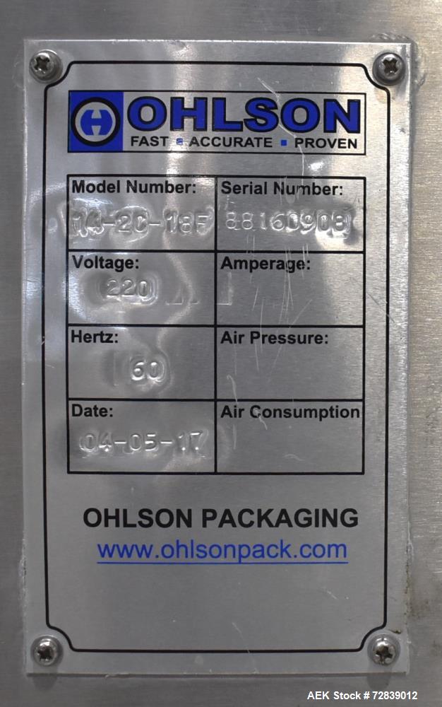 Used Ohlson Model 14-2C-18F Radial Combination Scale and Platform. 14-Dimple buckets. Weighing range approcimate 10 - 3000g. Max cycle speed 130 WPM. Has Syntron BF-2-B magnetic feeder. Serial# 88160...