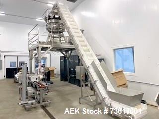 Used Ohlson (nVenia) Combination Scale Clamshell Packaging Line for Produce, Nuts or Microgreens. Capable of speeds up to 50 CPM. Line consists of Ohlson Model IC-18-8-SS S/S cleated belt infeed conv...