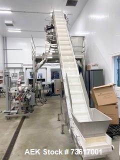 Used Ohlson (nVenia) Combination Scale Clamshell Packaging Line for Produce, Nuts or Microgreens. Capable of speeds up to 50 CPM. Line consists of Ohlson Model IC-18-8-SS S/S cleated belt infeed conv...