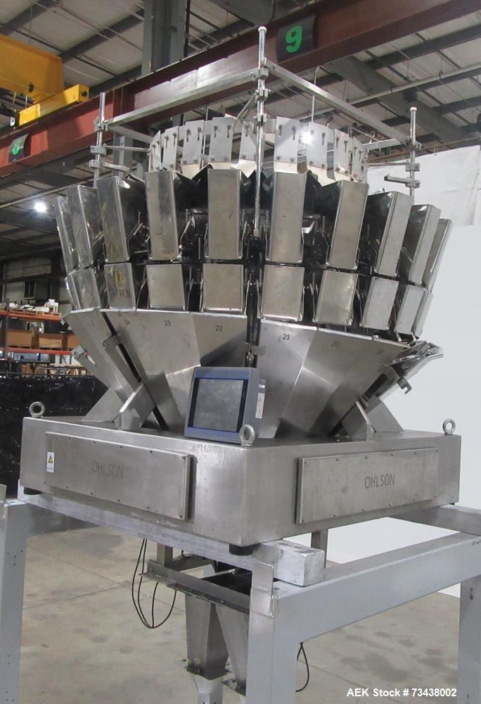 Used Ohlson Model MHW24F 24 Head Combination Scale. Stainless steel construction. Approximate 1.3 liter smooth buckets. Approximate maximum speeds up to 240 bags/min. Approximate weight range 15 - 30...