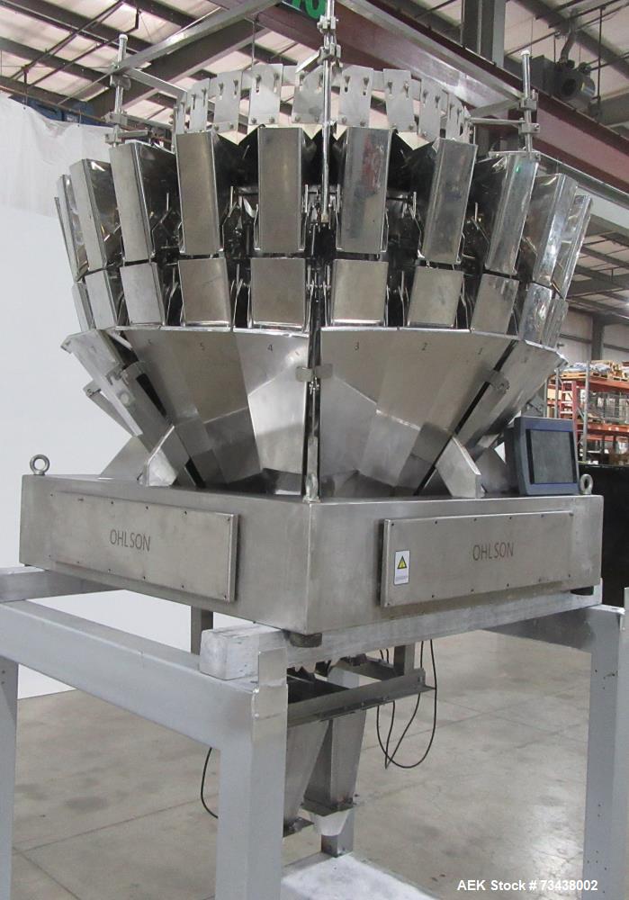Used Ohlson Model MHW24F 24 Head Combination Scale. Stainless steel construction. Approximate 1.3 liter smooth buckets. Approximate maximum speeds up to 240 bags/min. Approximate weight range 15 - 30...