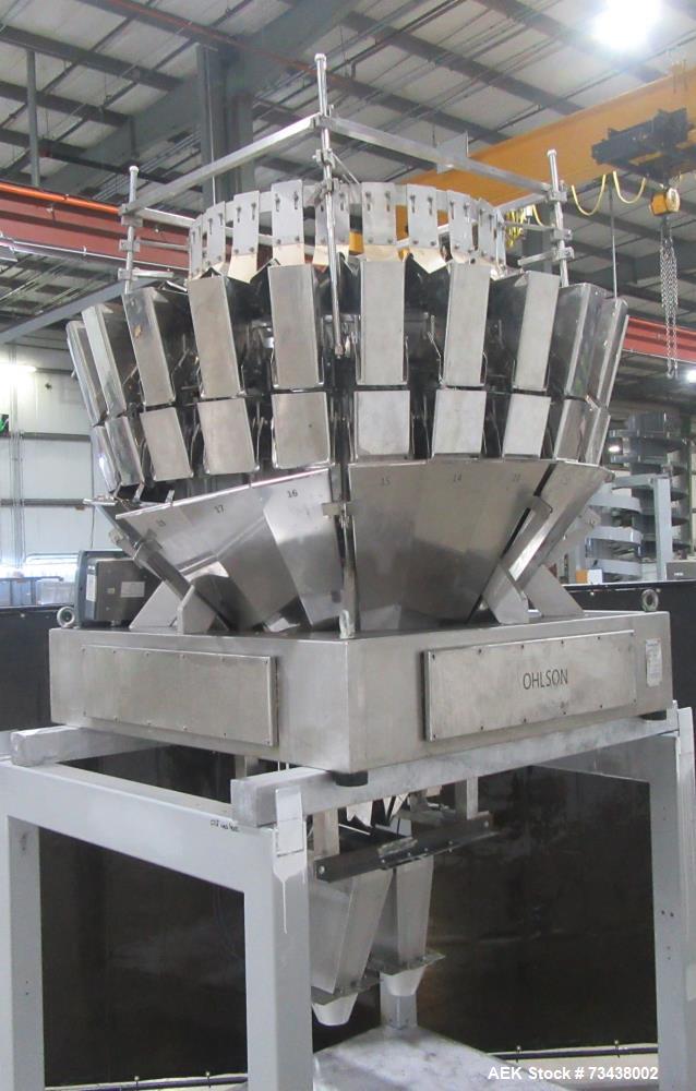 Used Ohlson Model MHW24F 24 Head Combination Scale. Stainless steel construction. Approximate 1.3 liter smooth buckets. Approximate maximum speeds up to 240 bags/min. Approximate weight range 15 - 30...