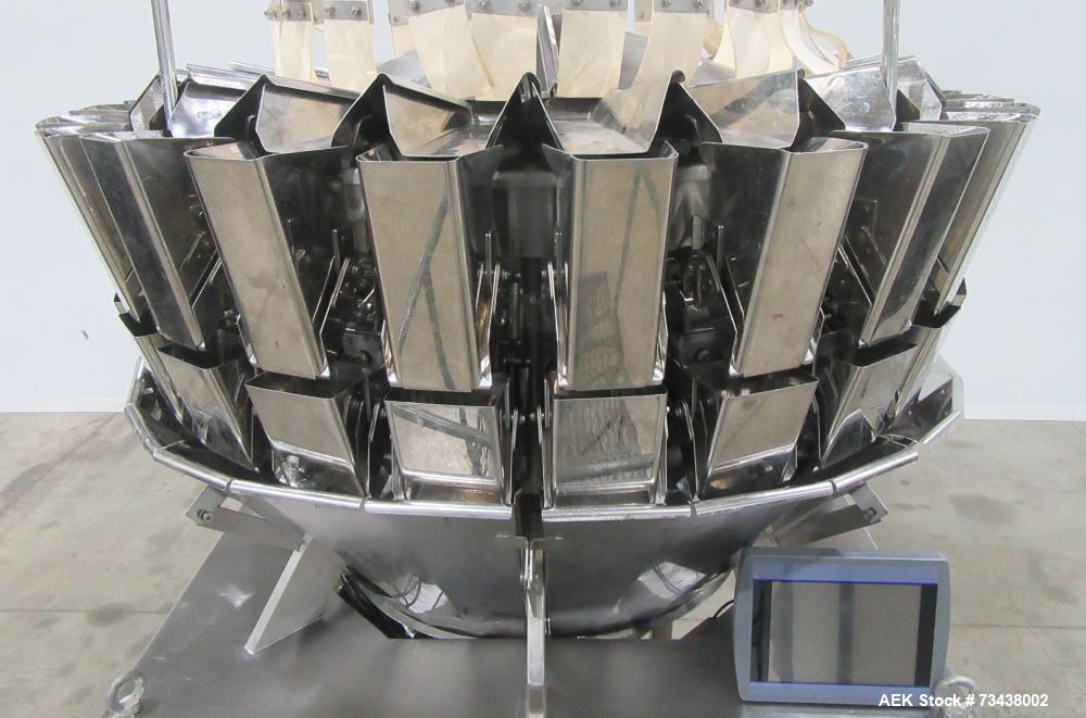 Used Ohlson Model MHW24F 24 Head Combination Scale. Stainless steel construction. Approximate 1.3 liter smooth buckets. Approximate maximum speeds up to 240 bags/min. Approximate weight range 15 - 30...
