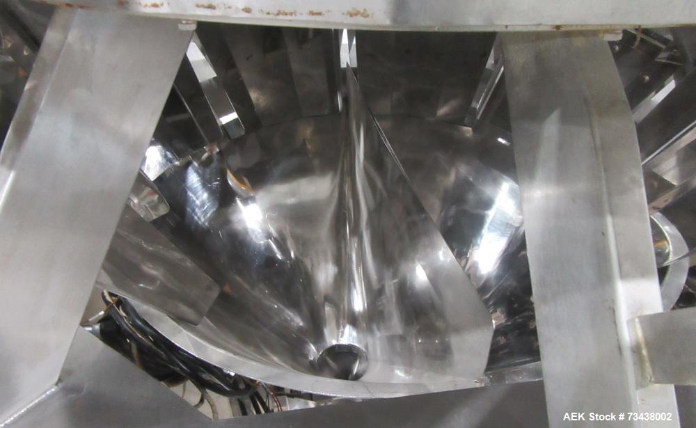 Used Ohlson Model MHW24F 24 Head Combination Scale. Stainless steel construction. Approximate 1.3 liter smooth buckets. Approximate maximum speeds up to 240 bags/min. Approximate weight range 15 - 30...