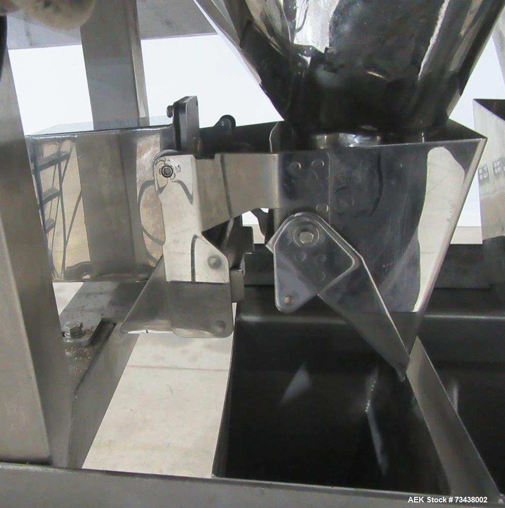 Used Ohlson Model MHW24F 24 Head Combination Scale. Stainless steel construction. Approximate 1.3 liter smooth buckets. Approximate maximum speeds up to 240 bags/min. Approximate weight range 15 - 30...