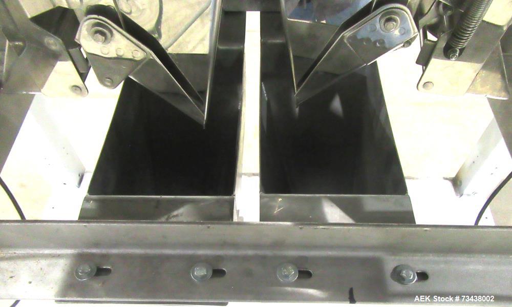 Used Ohlson Model MHW24F 24 Head Combination Scale. Stainless steel construction. Approximate 1.3 liter smooth buckets. Approximate maximum speeds up to 240 bags/min. Approximate weight range 15 - 30...