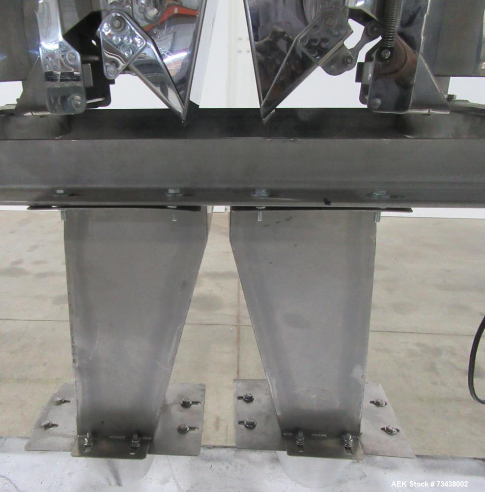 Used Ohlson Model MHW24F 24 Head Combination Scale. Stainless steel construction. Approximate 1.3 liter smooth buckets. Approximate maximum speeds up to 240 bags/min. Approximate weight range 15 - 30...