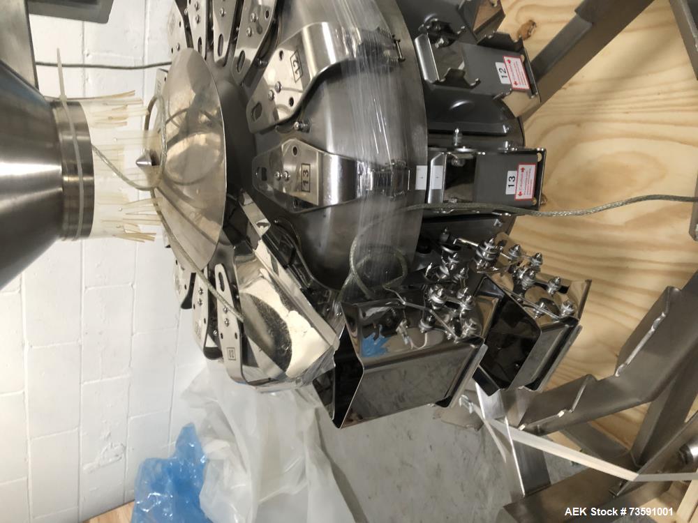 Used Weighpack Primo Combi 14 Head Smooth Bucket Combination Scale. Capable of speeds up to 200 weighs per minute (depending on application. Ha .5 Liter buckets with a weight range: 1 - 454 (grams) w...