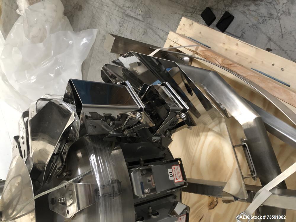 Used Weighpack Primo Combi 14 Head Smooth Bucket Combination Scale. Capable of speeds up to 200 weighs per minute (depending on application. Ha .5 Liter buckets with a weight range: 1 - 454 (grams) w...