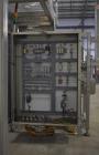 Used- Clamshell Indexing System: Originally set up to run 3oz. (7