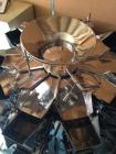 Used Combi Scale 10 Head Scale.  Stainless steel smooth bucket.  Rated up to 140 cycles per mnute.  Includes controls.