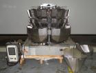 Used Ishida 16 Head Multi-Purpose Weigher, Model CCW-Z-216B-D/30-WP, Stainless Steel Contact Parts. Designed for different weights of up to four products simultaneously, for discharge into the same p...