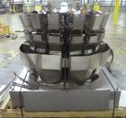 Used Ishida 16 Head Multi-Purpose Weigher, Model CCW-Z-216B-D/30-WP, Stainless Steel Contact Parts. Designed for different weights of up to four products simultaneously, for discharge into the same p...