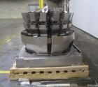 Used Ishida 16 Head Multi-Purpose Weigher, Model CCW-Z-216B-D/30-WP, Stainless Steel Contact Parts. Designed for different weights of up to four products simultaneously, for discharge into the same p...